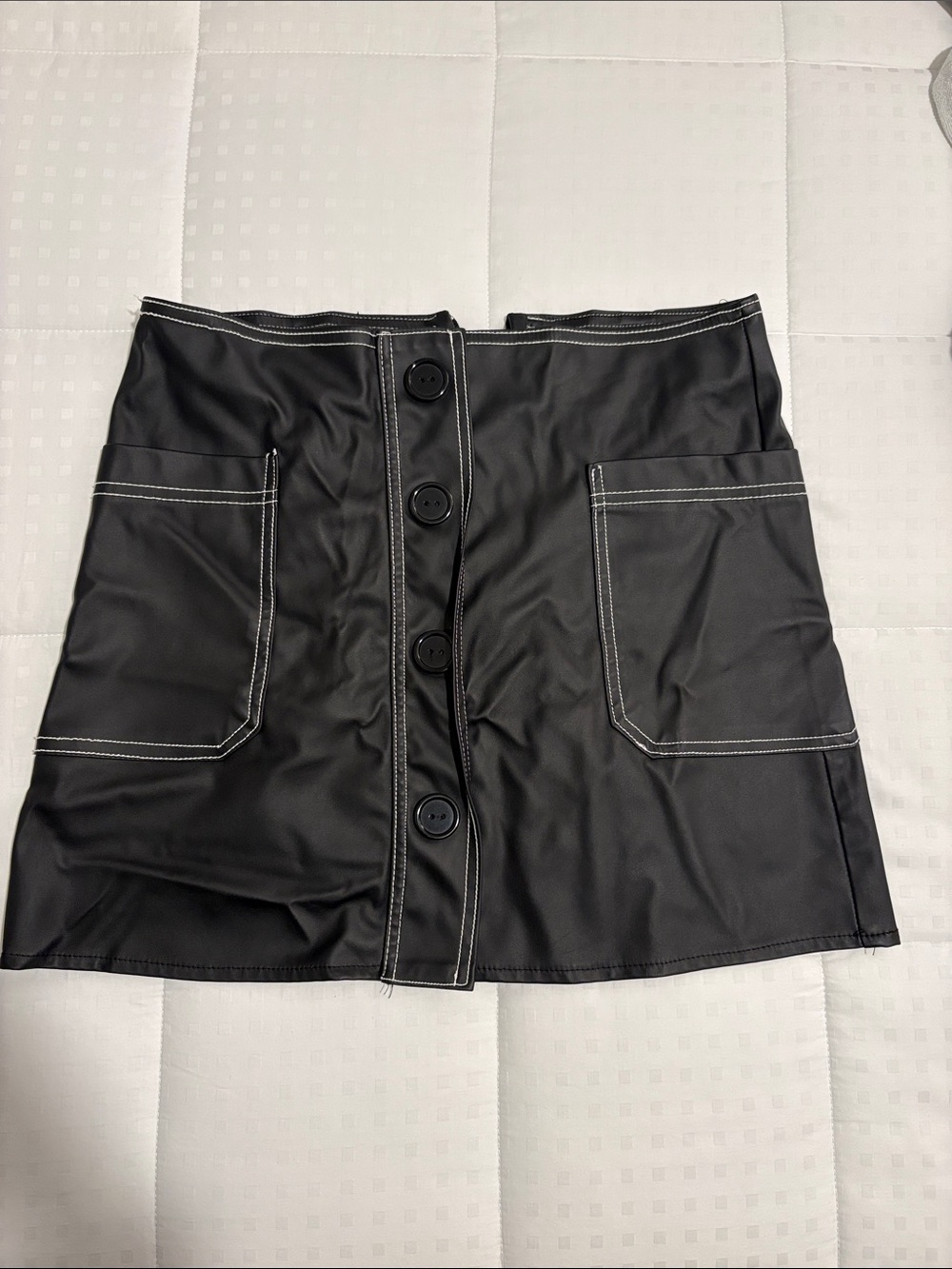 High-Rise Black Faux Leather Mini Skirt with Front Buttons